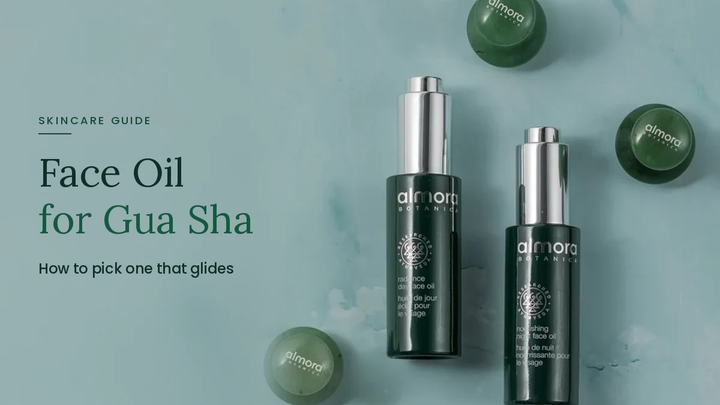Almora Botanica face oil bottles with green gua sha stones, face oil for gua sha guide